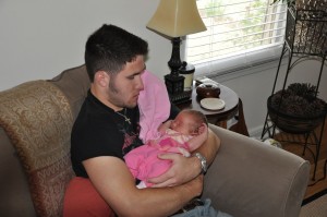 Andrew holding his niece, Vivian