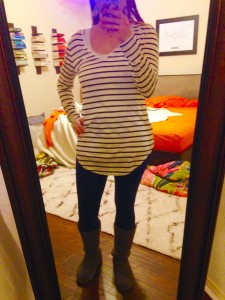 Black and white striped tunic, blue leggings, and gray knit boots